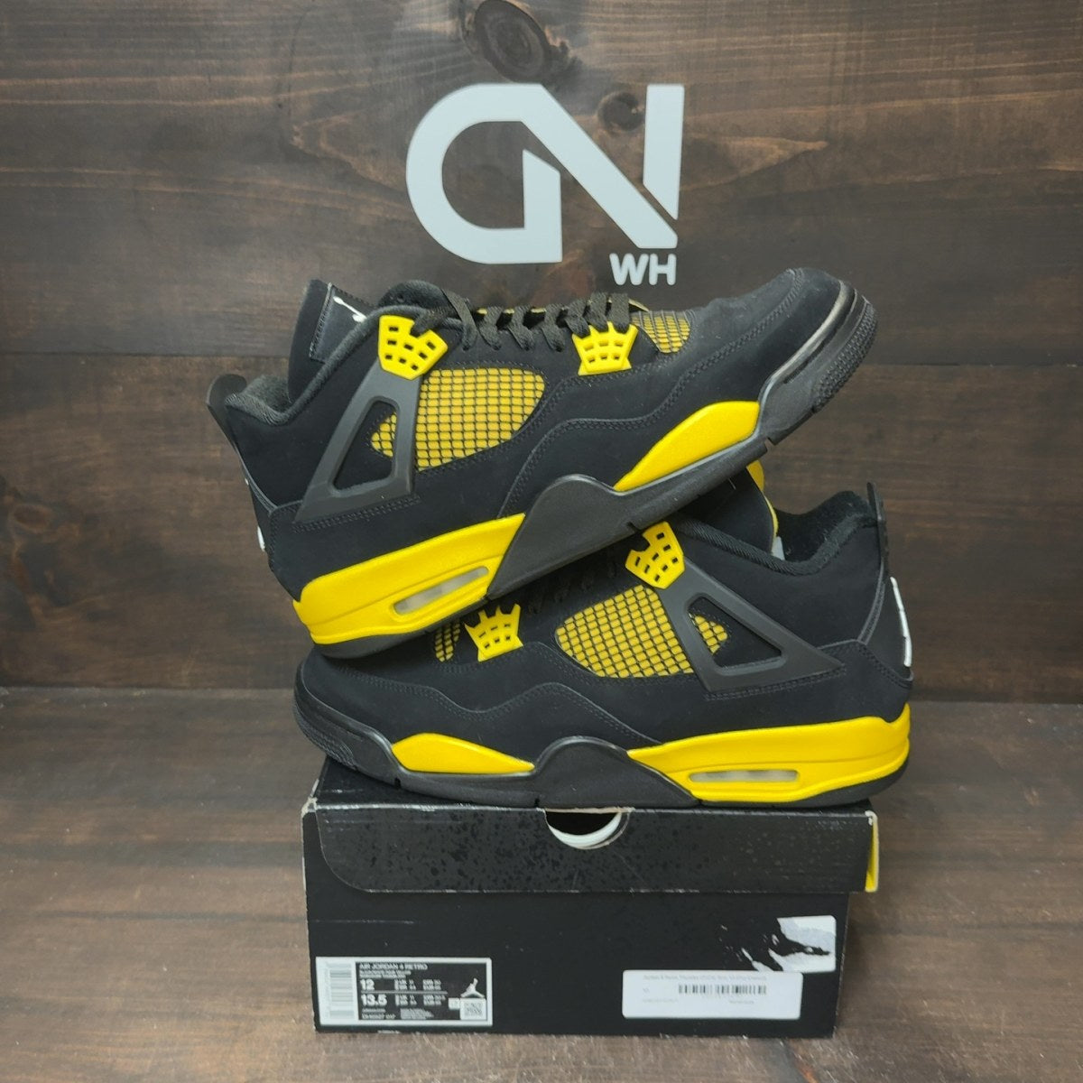 Jordan 4 Retro Thunder (2023) - Image 1