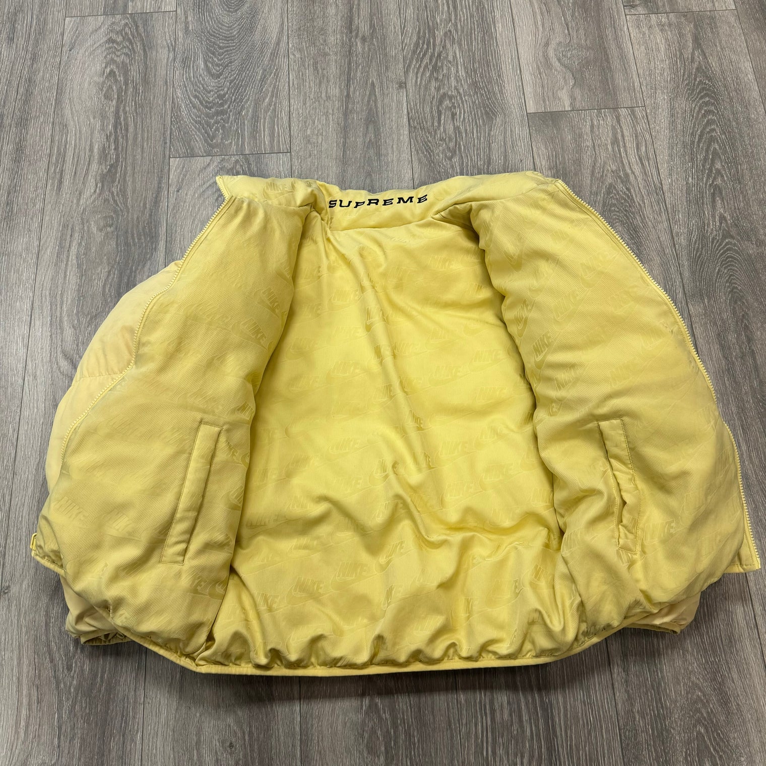 Supreme Nike Pale Yellow Puffer Jacket (USED)