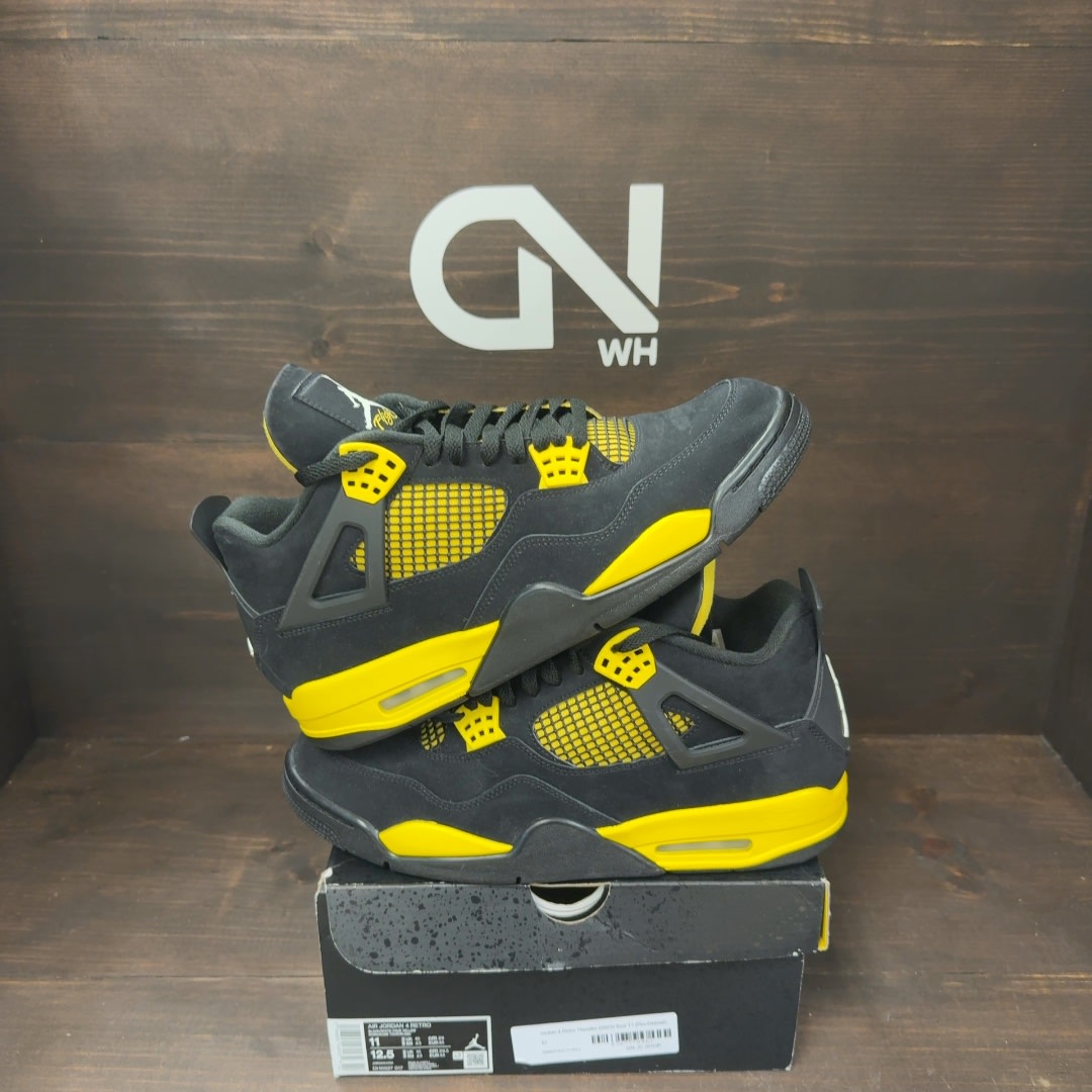 Jordan 4 Retro Thunder (2023) - Image 1