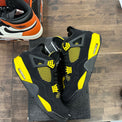 Jordan 4 Retro Thunder (2023) - Image 1