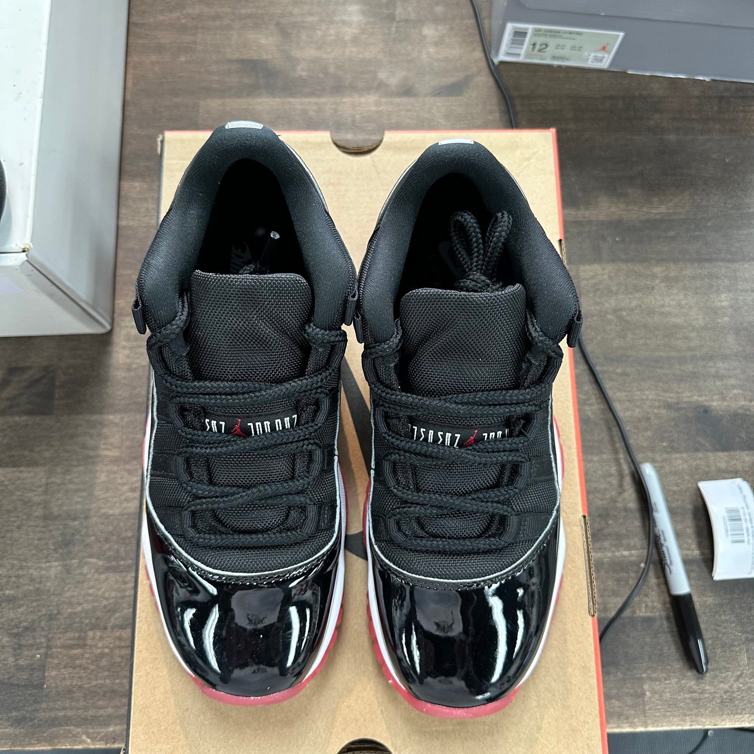 Bred Jordan 11 Retro Low (GS) (USED)