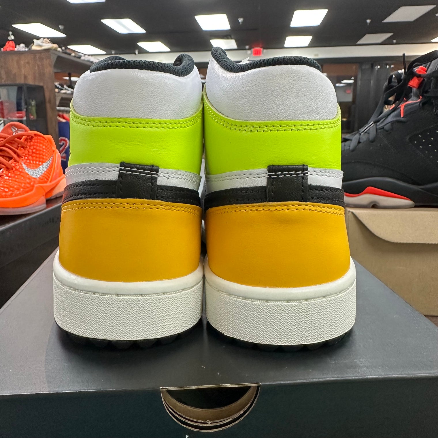 University Gold Volt Black Jordan 1 Retro High Golf