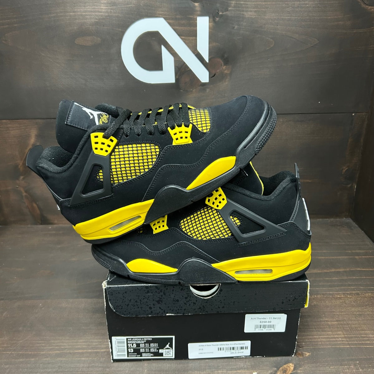 Jordan 4 Retro Thunder (2023) - Image 1