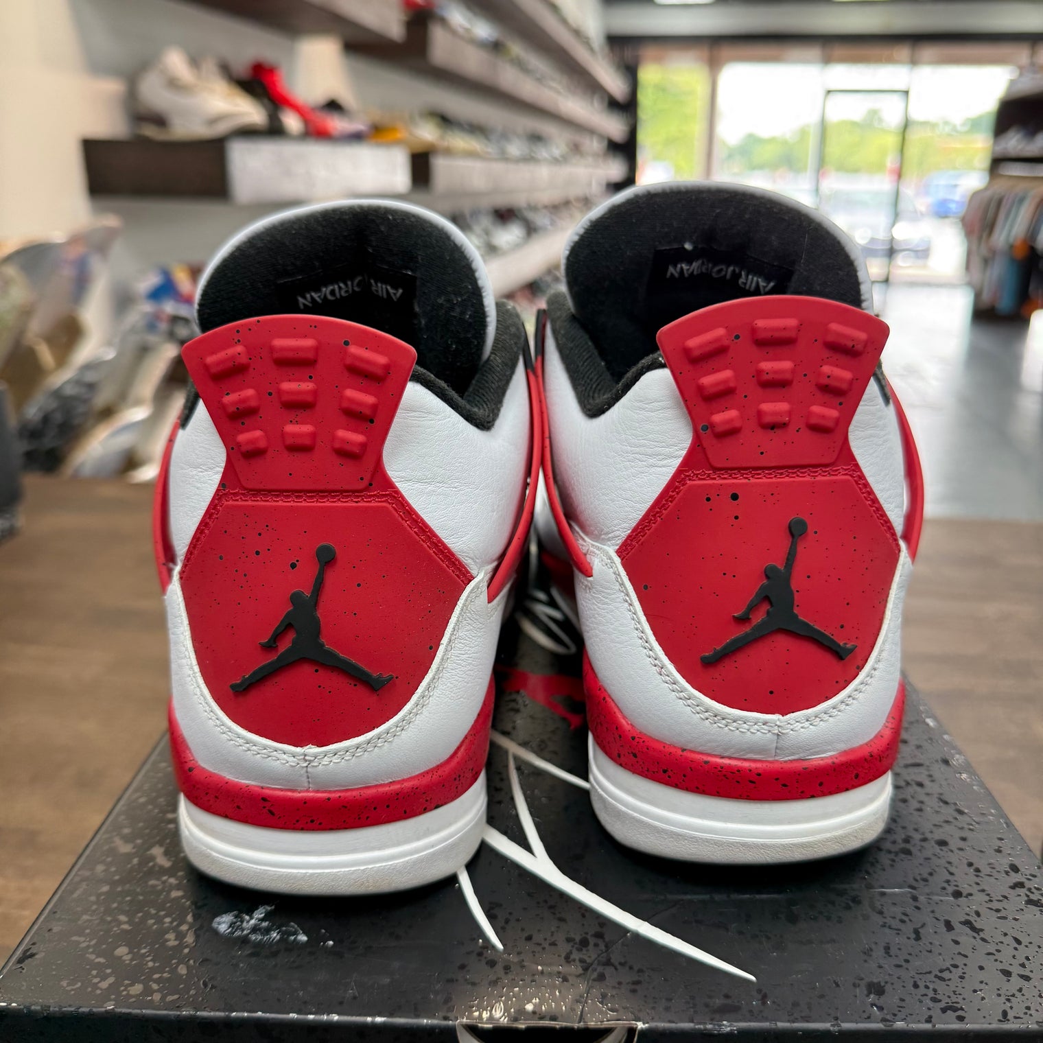 Red Cement Jordan 4 (USED)