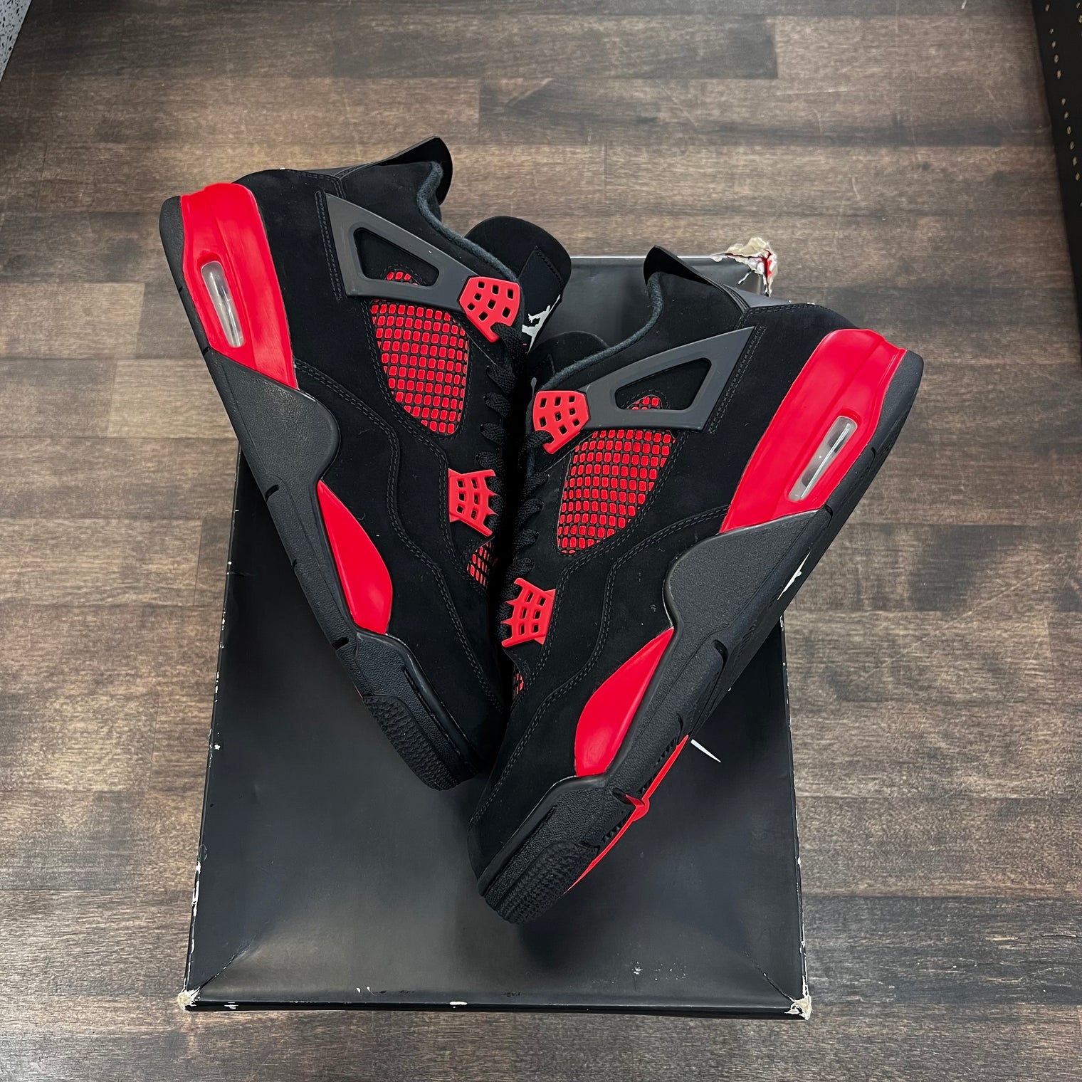 Red Thunder Jordan 4 (Lightly Worn)