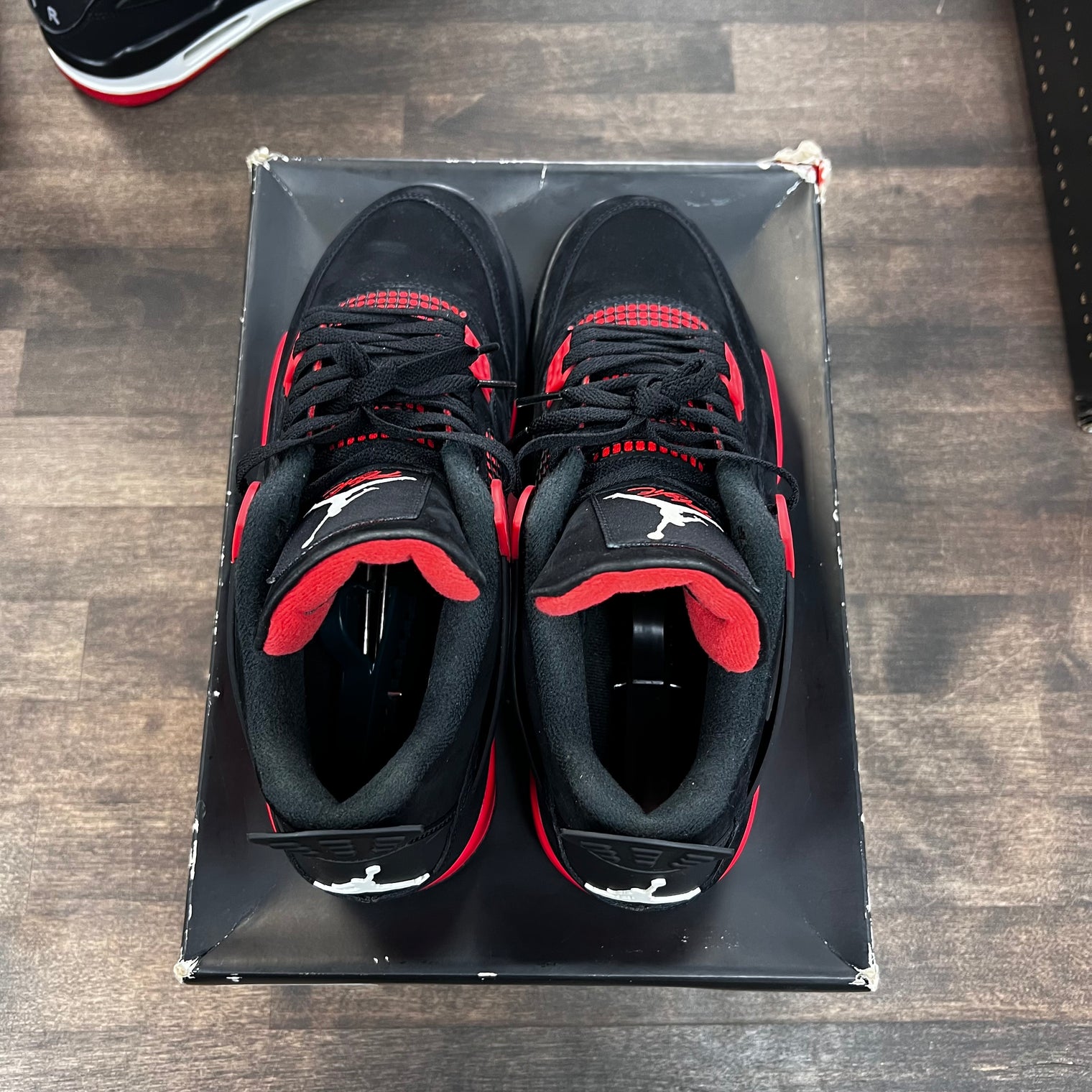 Red Thunder Jordan 4 (Lightly Worn)