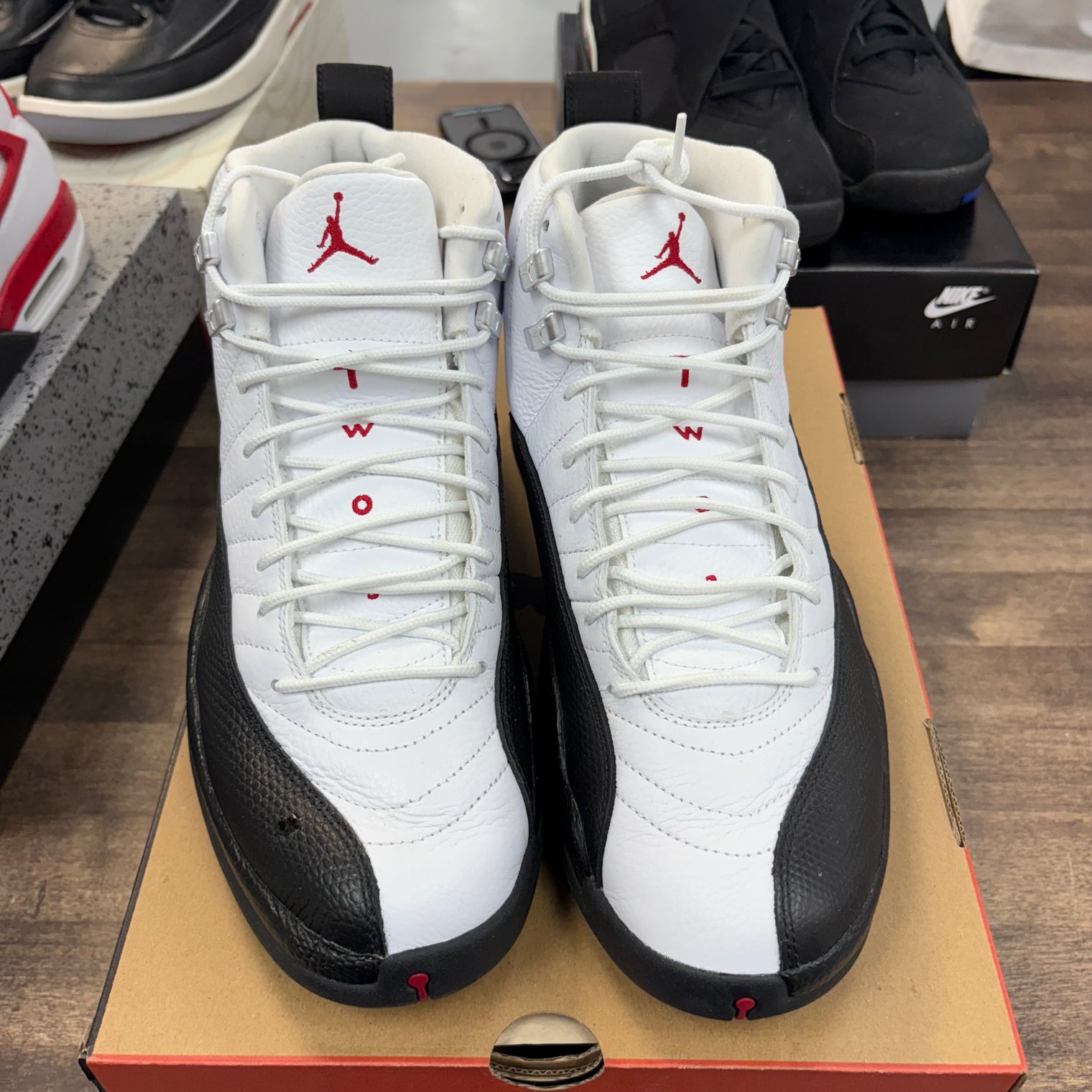 Taxi Flip Jordan 12 Retro (USED)