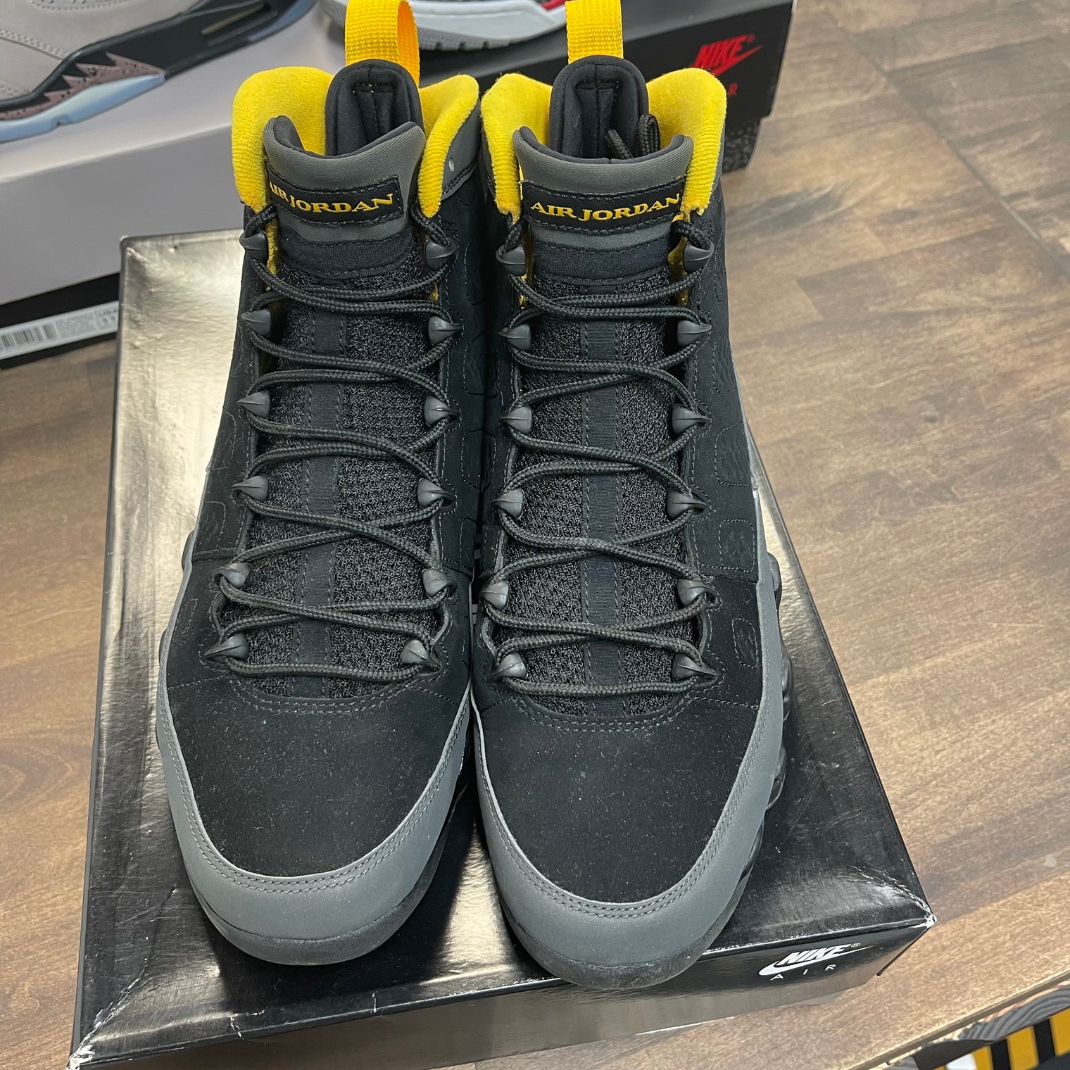 University Gold Dark Charcoal Jordan 9 Retro (USED)
