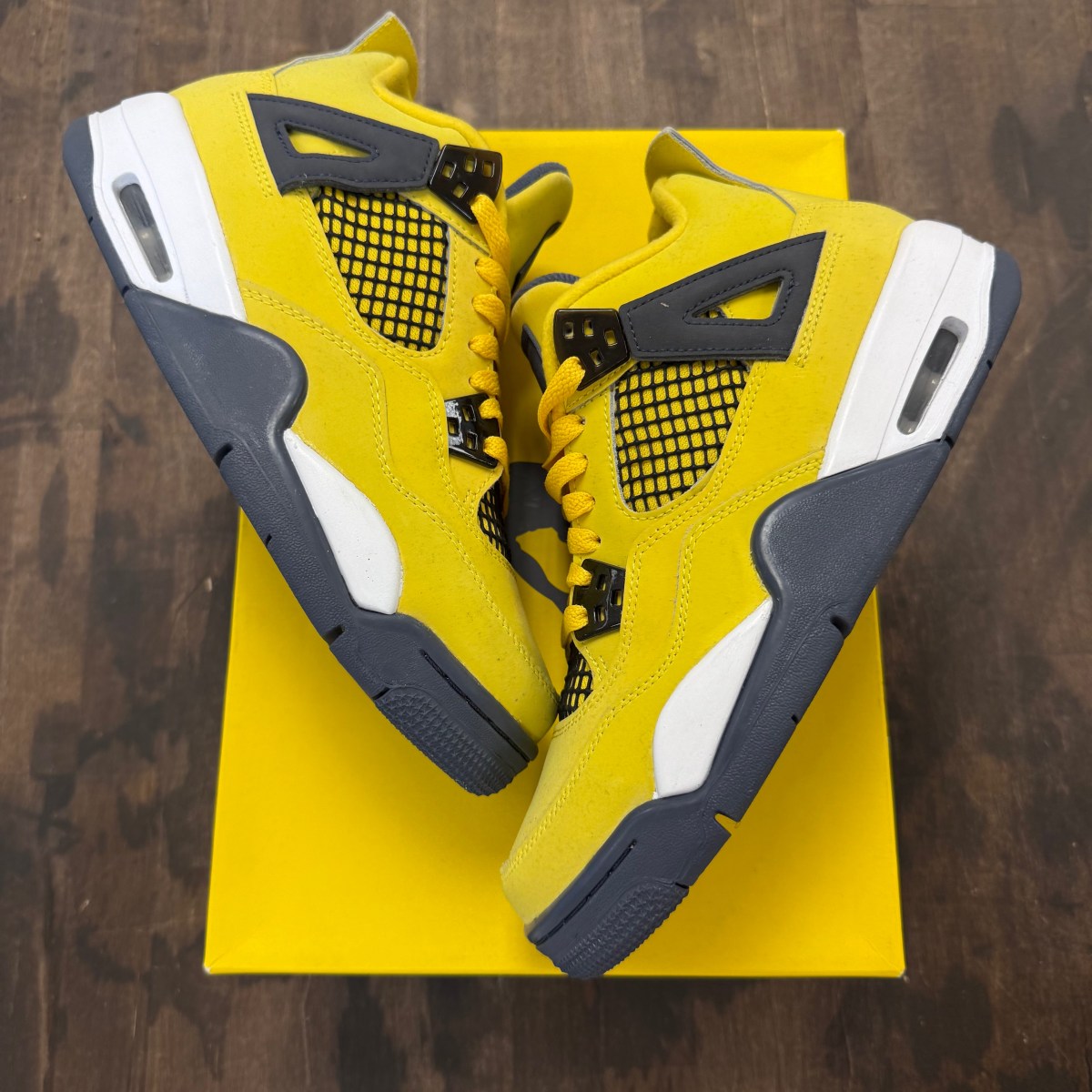 Jordan 4 Retro Lightning (2021) (GS) - Image 1