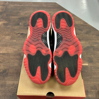 Bred Jordan 11 Retro Low (USED)
