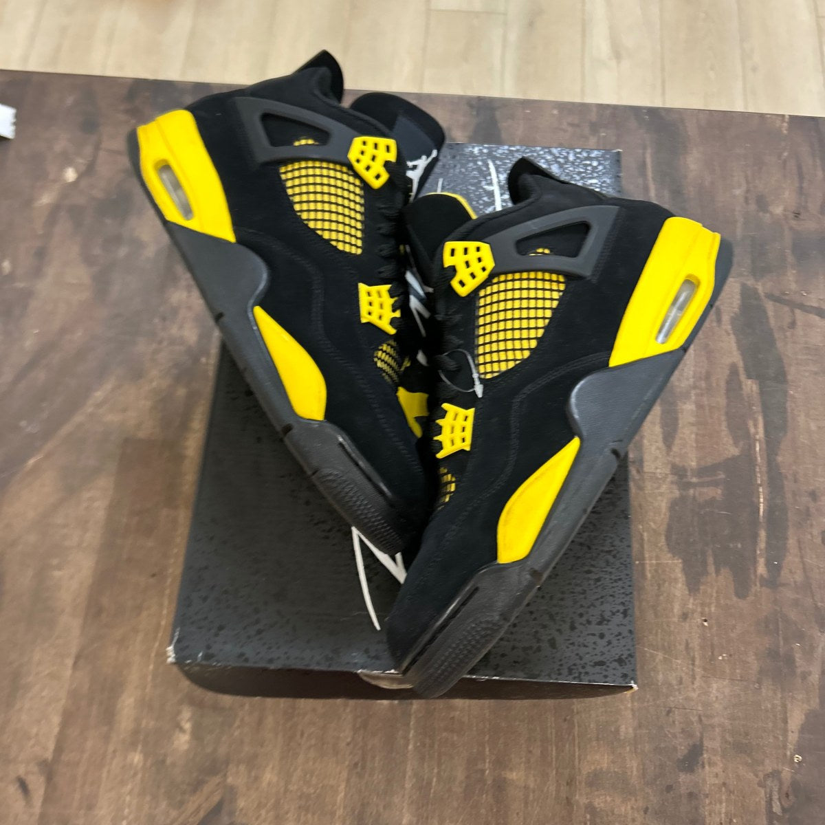 Jordan 4 Retro Thunder (2023) - Image 1