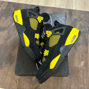 Jordan 4 Retro Thunder (2023) - Image 1