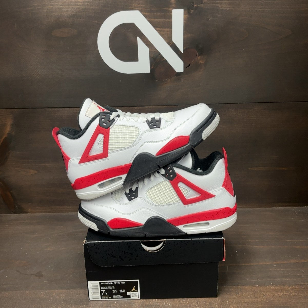 Jordan 4 Retro Red Cement (GS) - Image 1