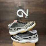 Jordan 11 Retro Low IE Black Cement Size 9 (Pre-Owned) - Image 1