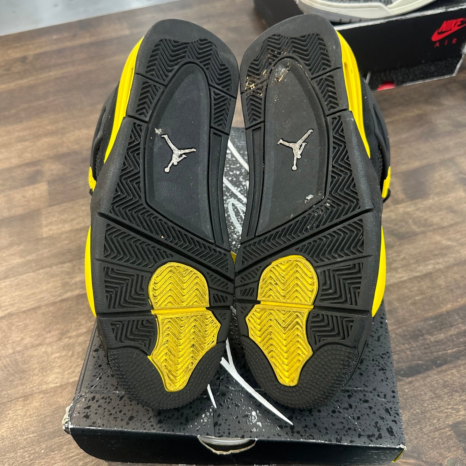 Yellow Thunder Jordan 4 (USED)