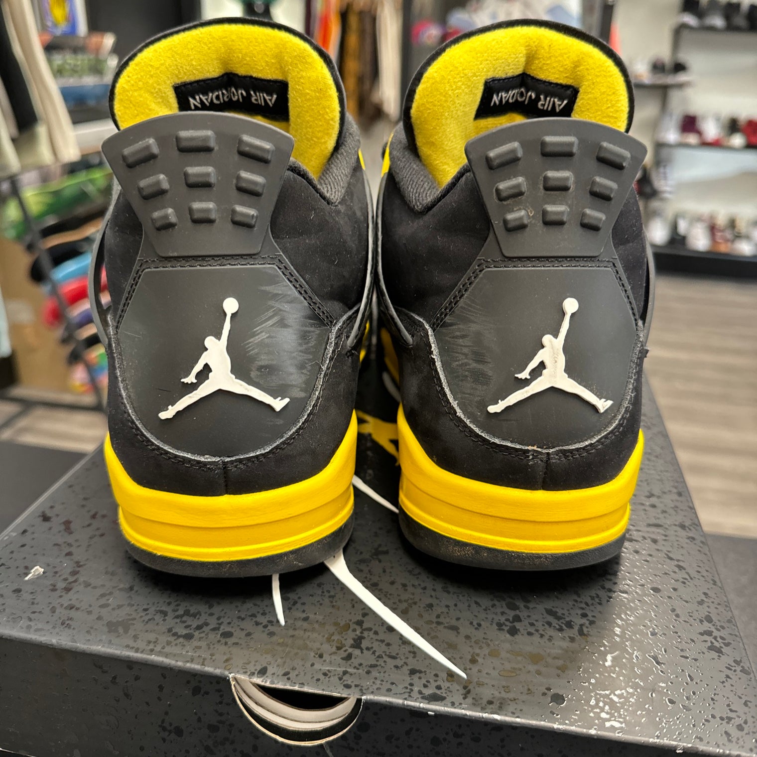 Yellow Thunder Jordan 4 (USED)