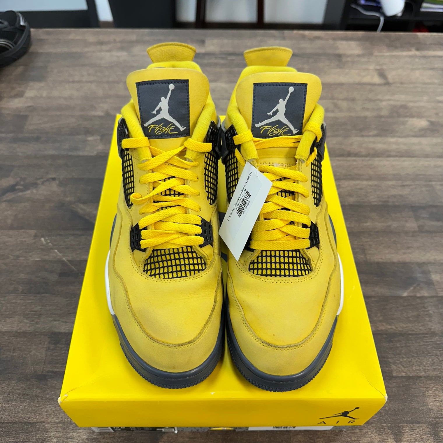 Lightning Jordan 4 Retro (USED)