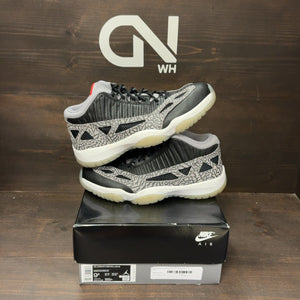 Jordan 11 Retro Low IE Black Cement - Image 1