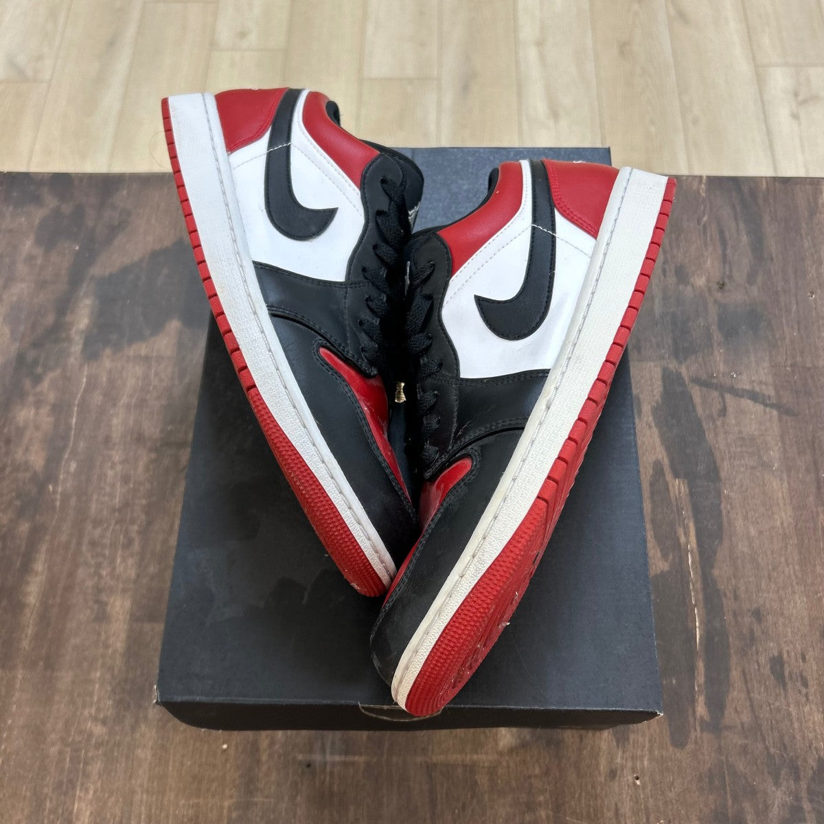 Jordan 1 Low Bred Toe - Image 1