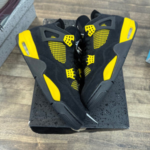 Jordan 4 Retro Thunder (2023) - Image 1