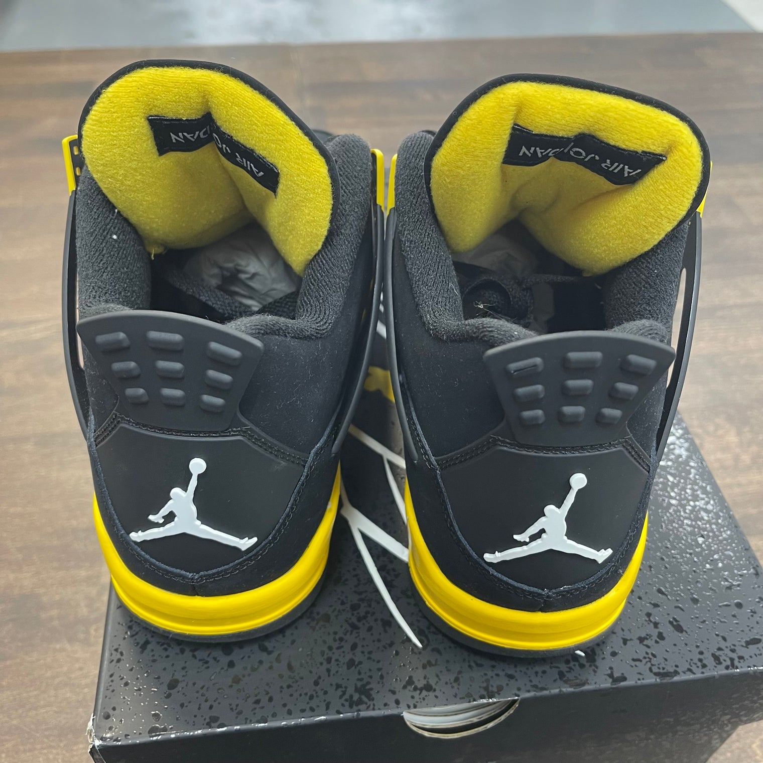 Yellow Thunder Jordan 4 (USED)