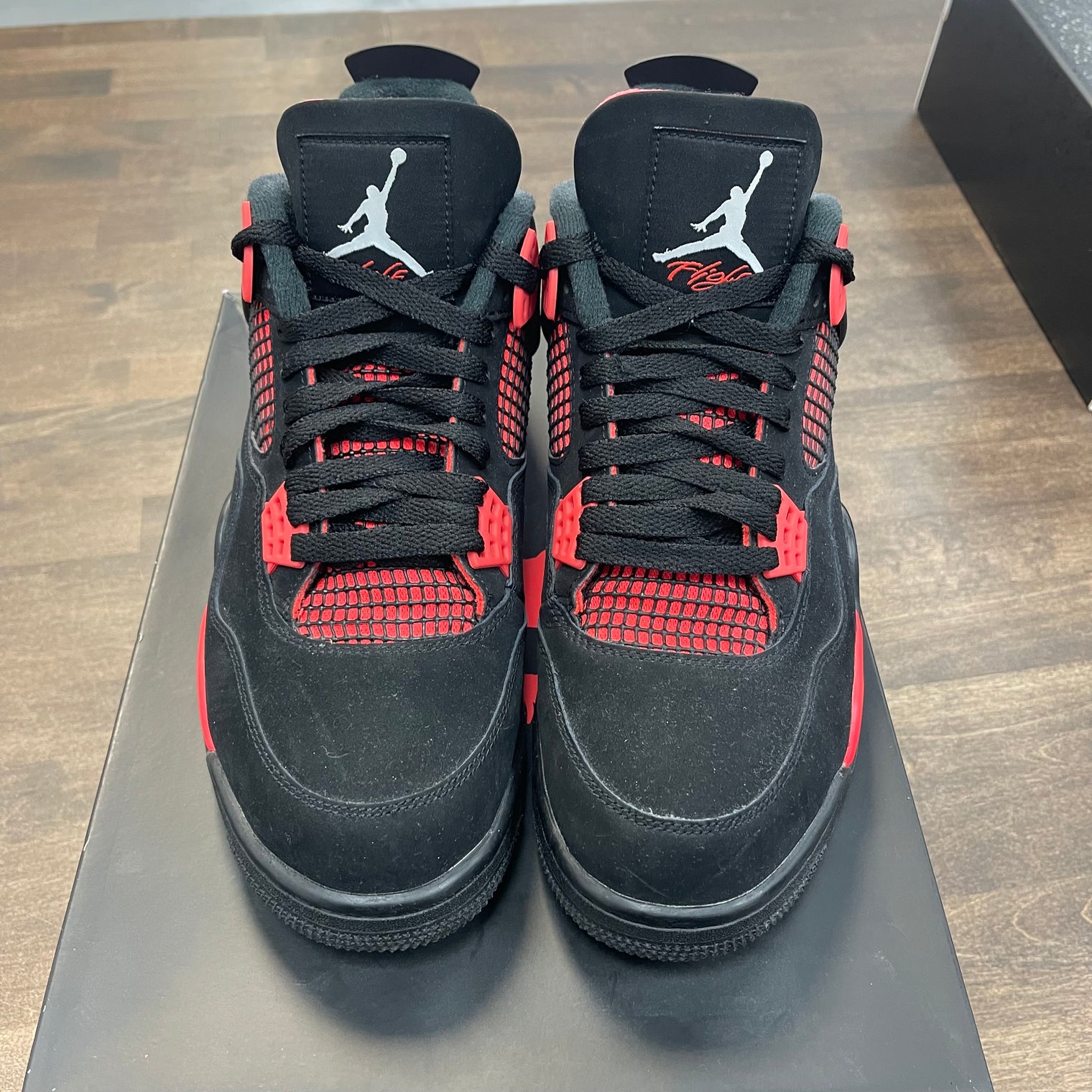 Red Thunder Jordan 4 (USED)