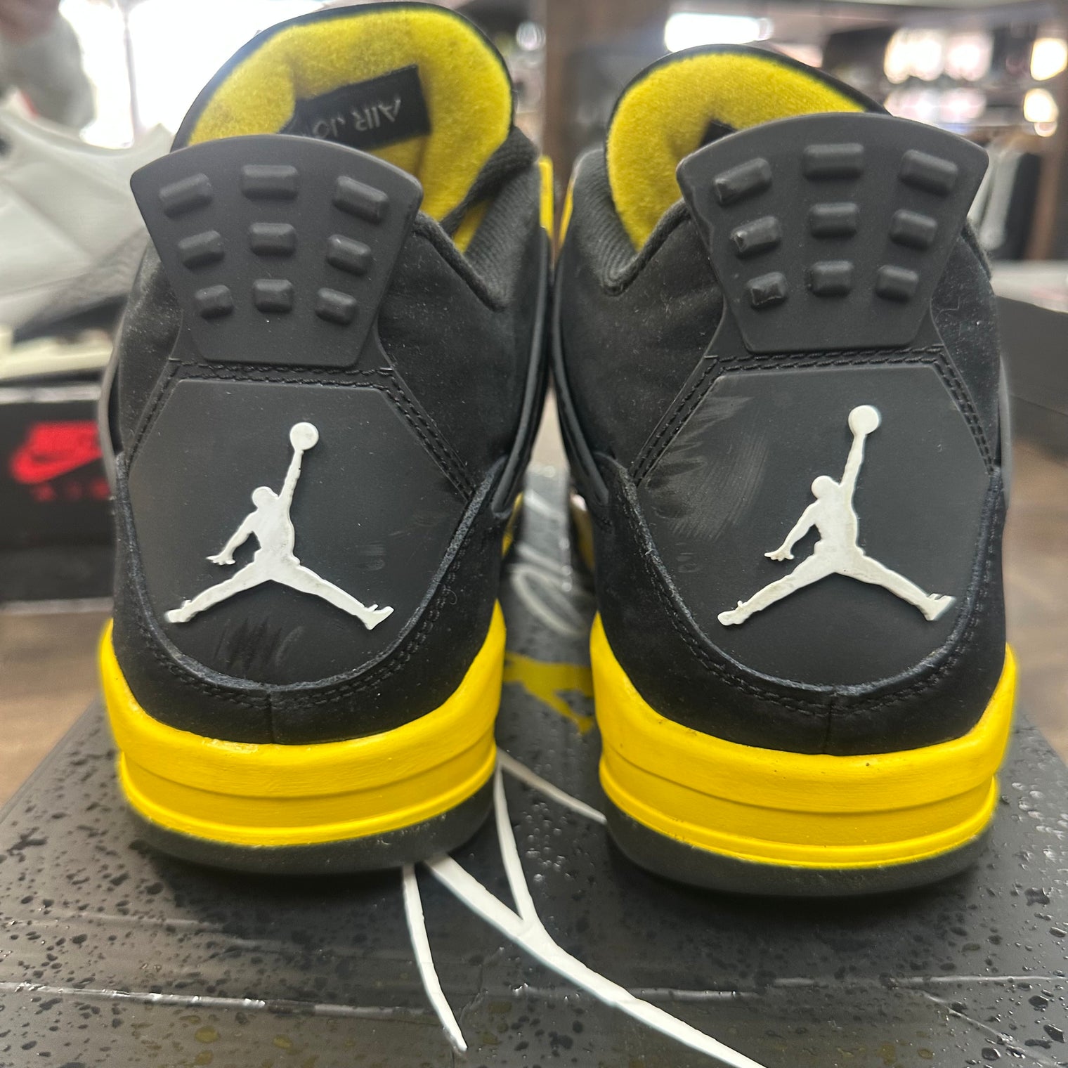 Yellow Thunder Jordan 4 (USED)