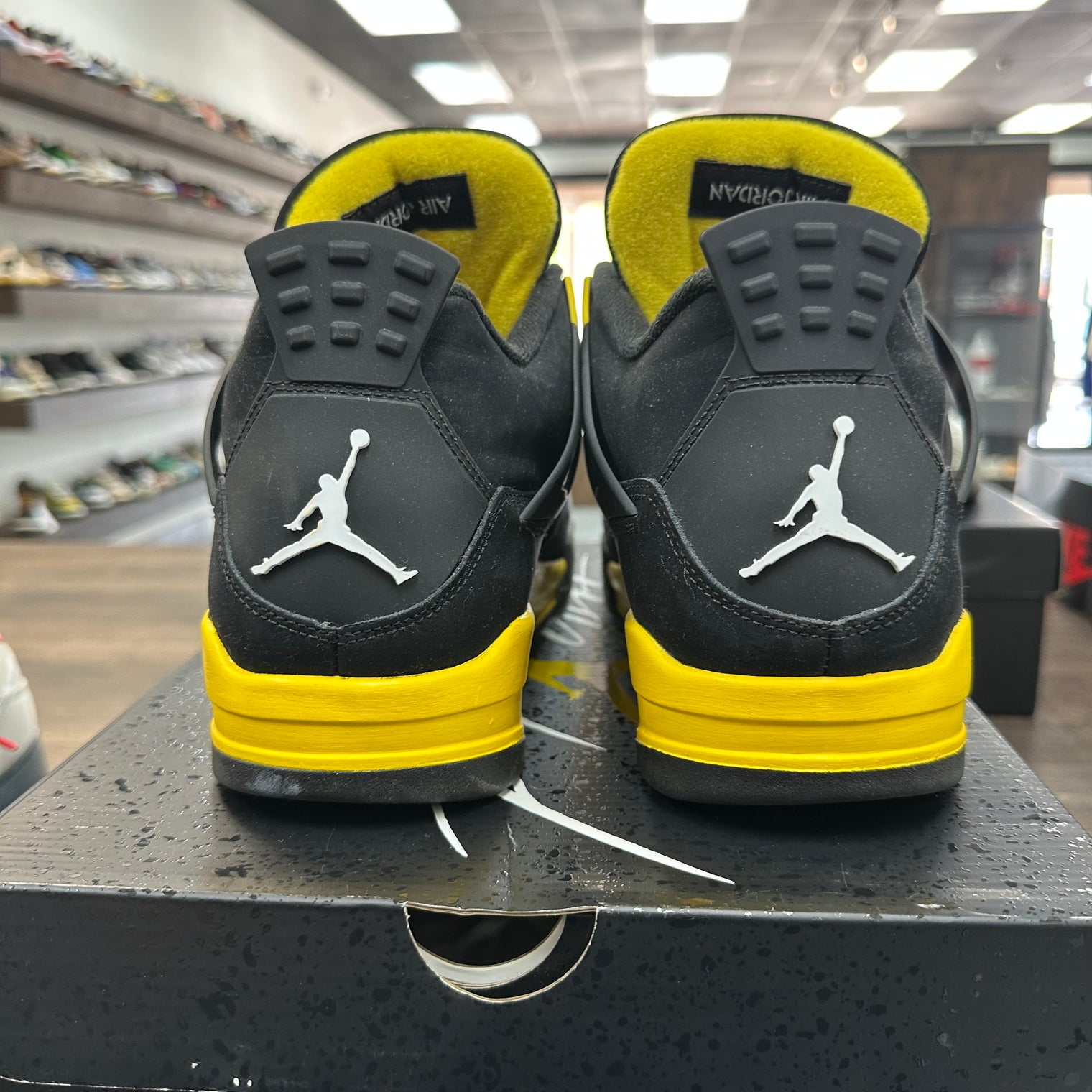Yellow Thunder Jordan 4 (USED)
