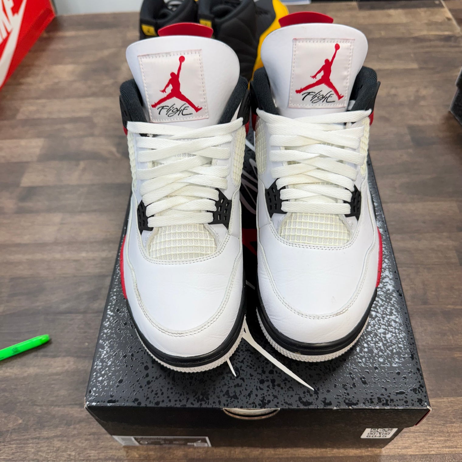 Red Cement Jordan 4 (USED)