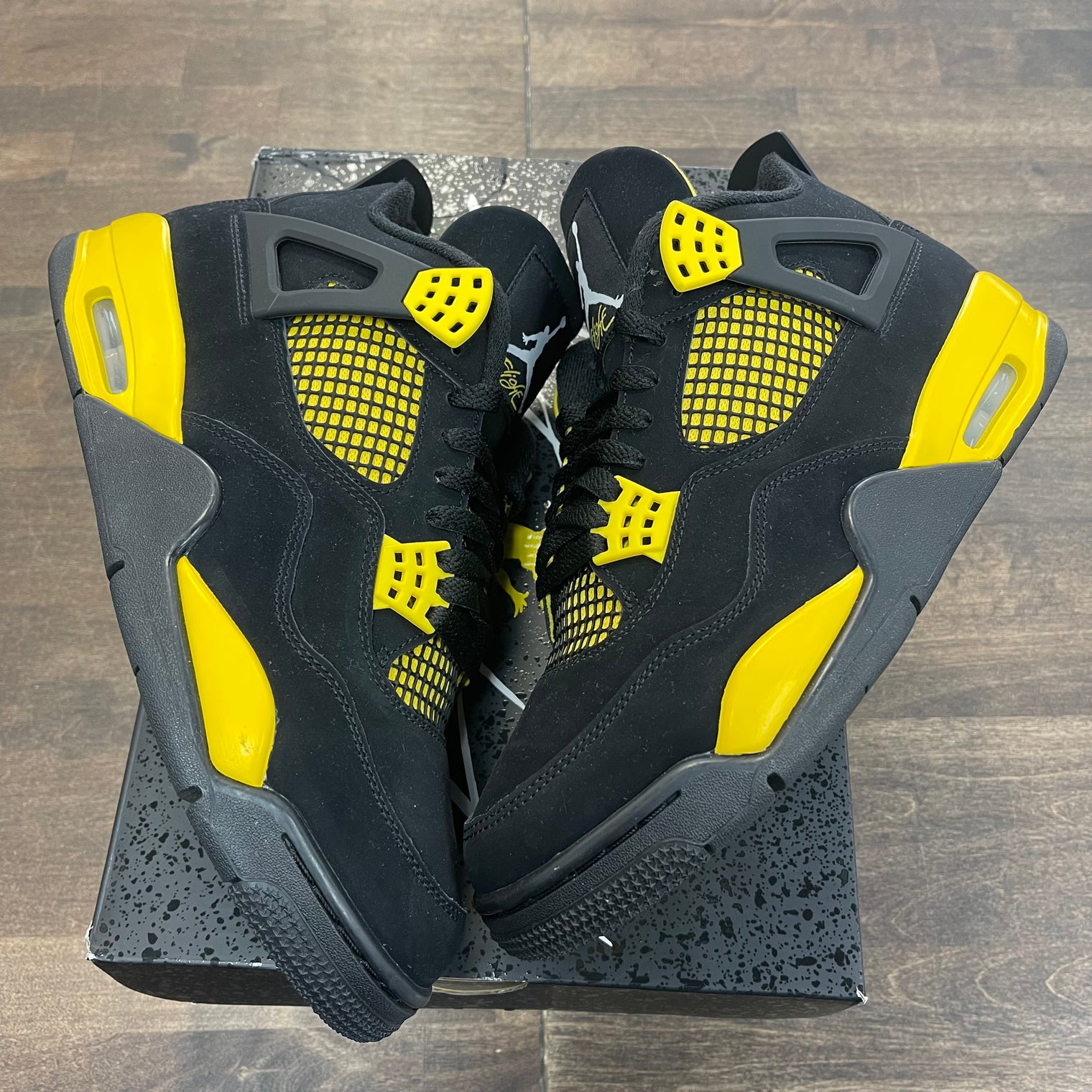 Yellow Thunder Jordan 4 (USED)