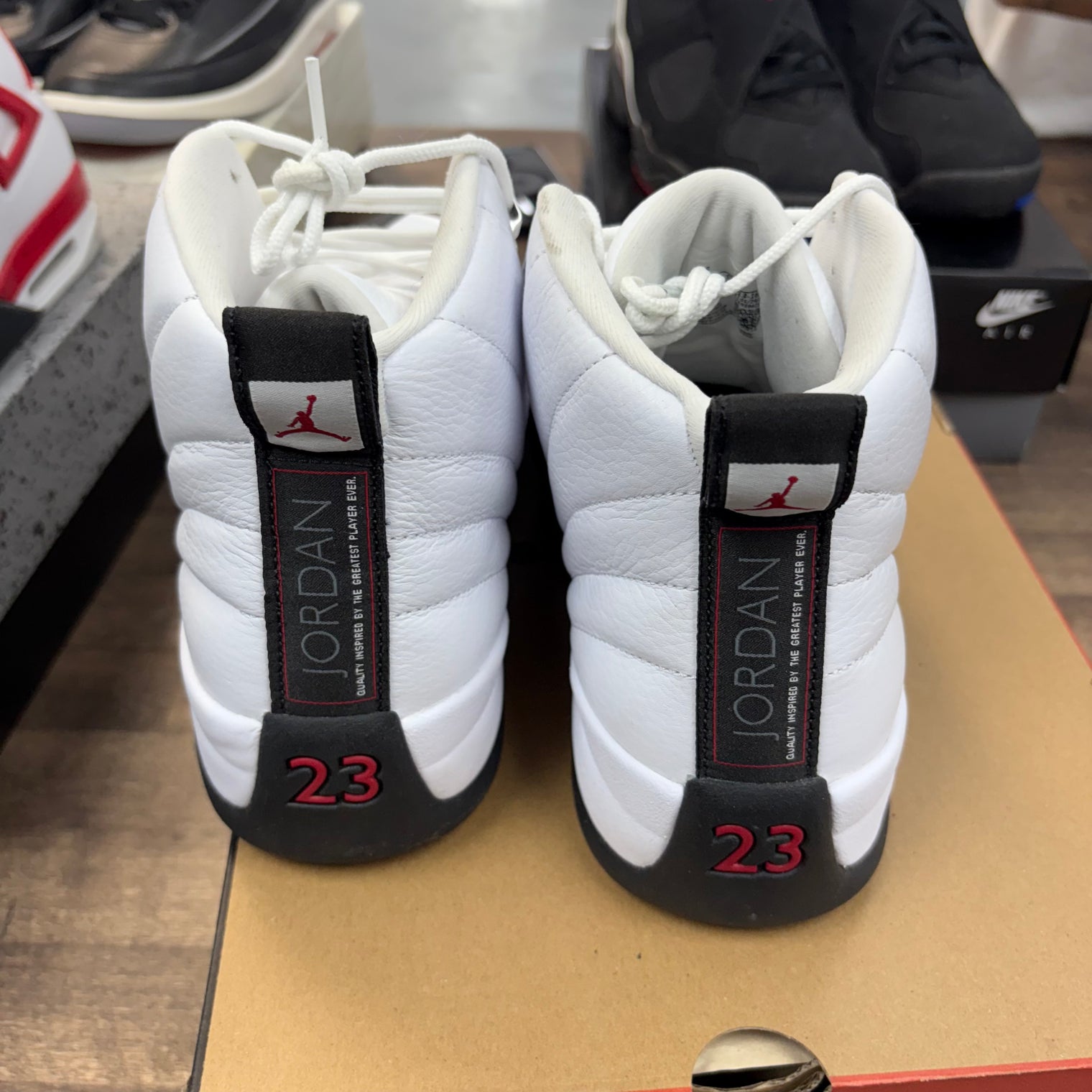 Taxi Flip Jordan 12 Retro (USED)