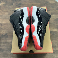 Bred Jordan 11 Retro Low (USED)