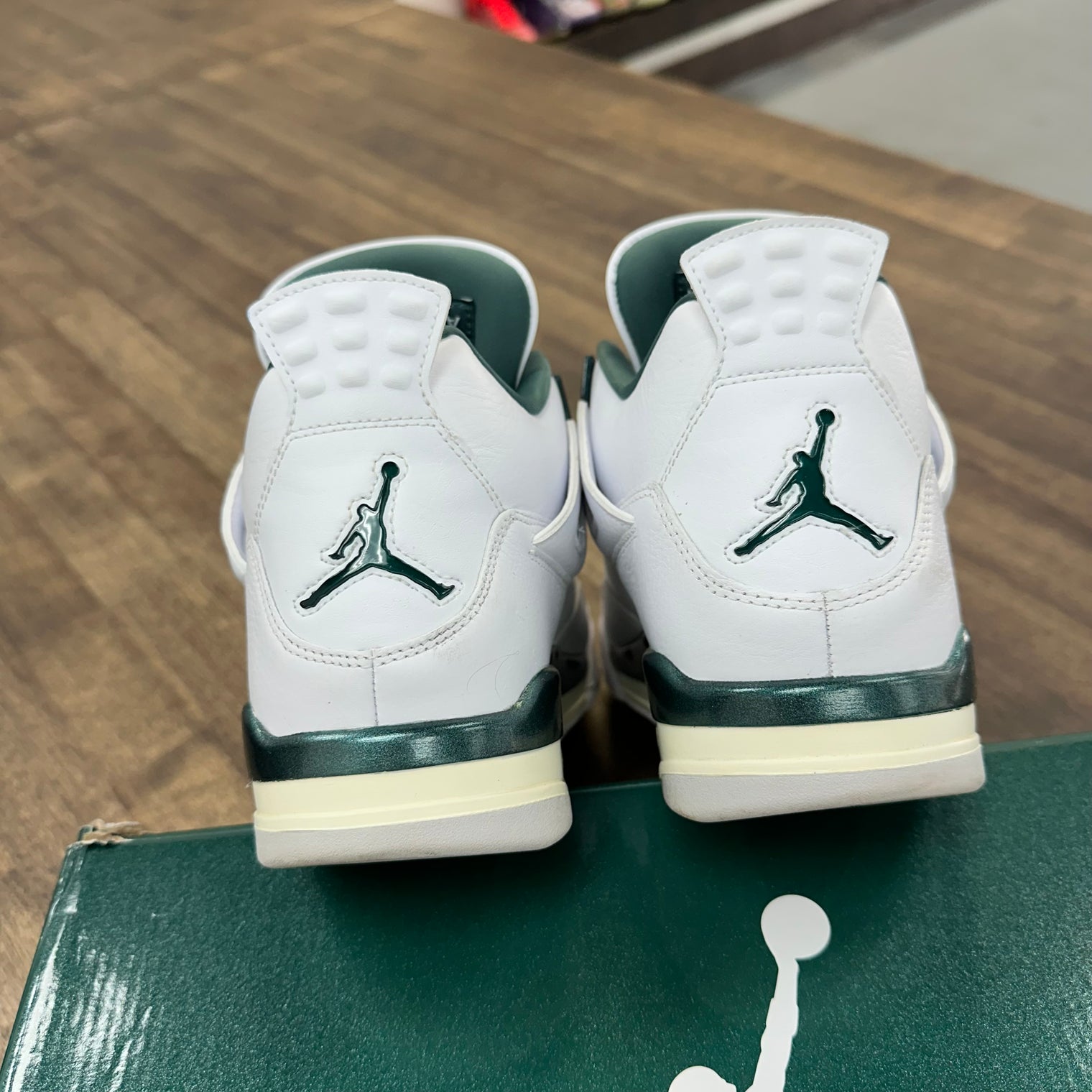Oxidized Green Jordan 4 Retro (USED)