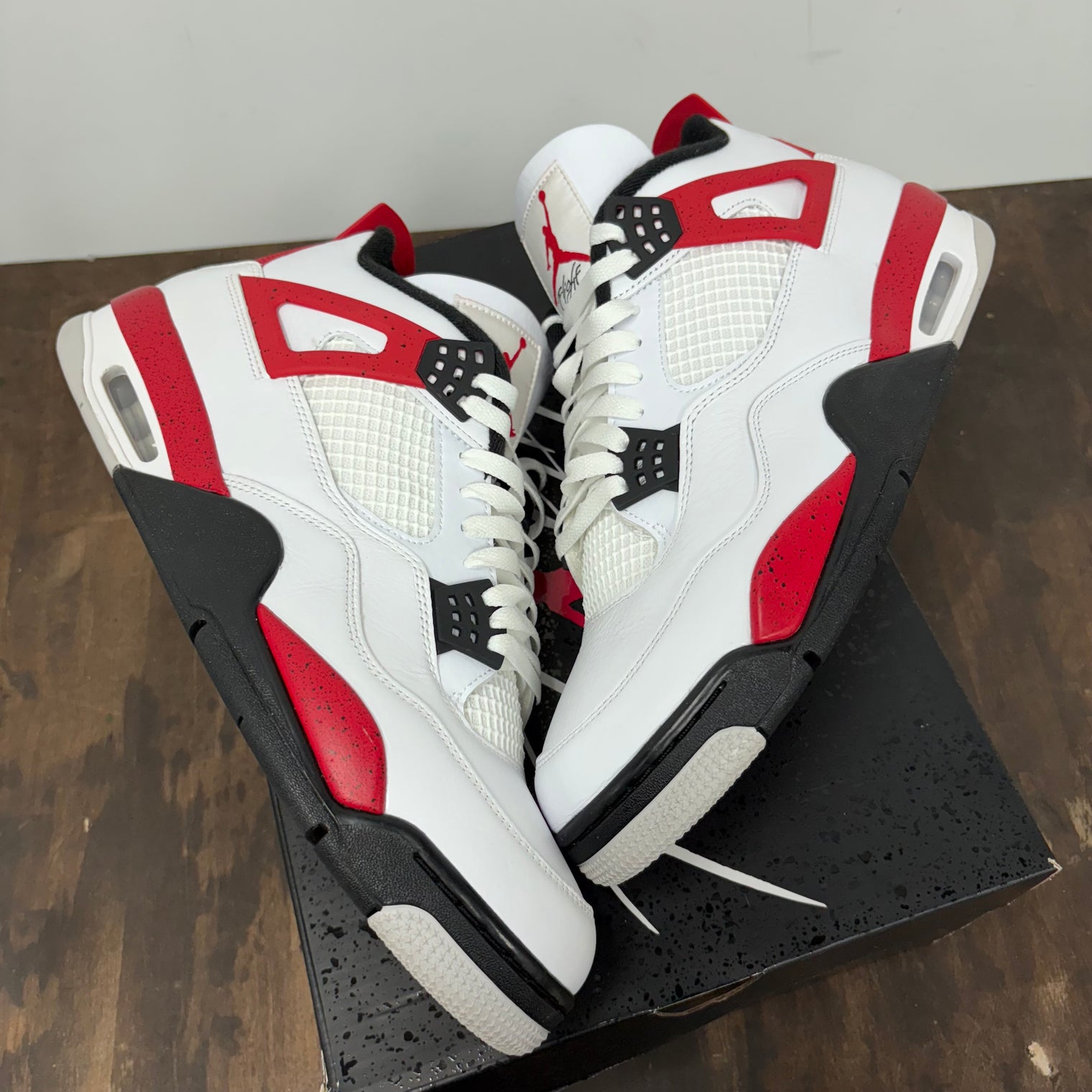 Red Cement Jordan 4 (USED)