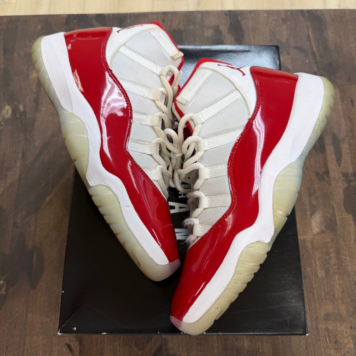 Jordan 11 Retro Cherry (2022) - Image 1
