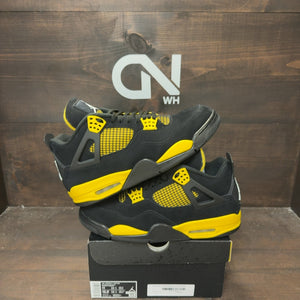 Jordan 4 Retro Thunder (2023) - Image 1