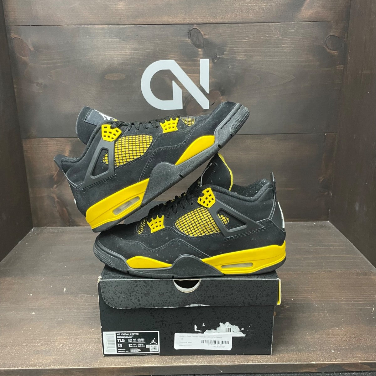 Jordan 4 Retro Thunder (2023) - Image 1