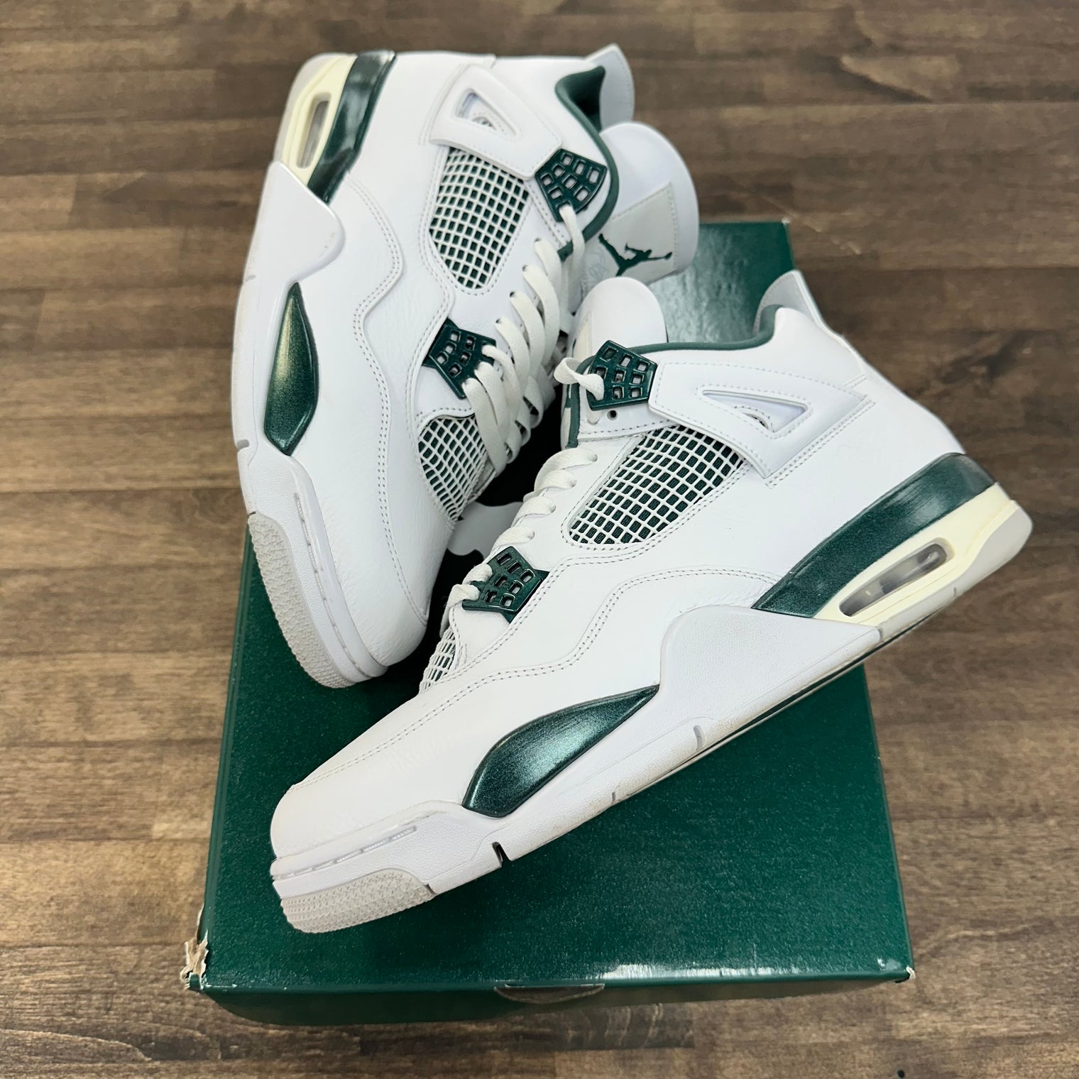 Oxidized Green Jordan 4 Retro (USED)