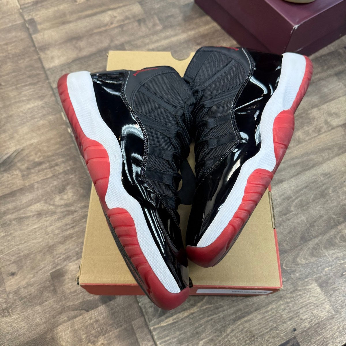 Jordan 11 Retro Playoffs Bred (2019) - Image 1