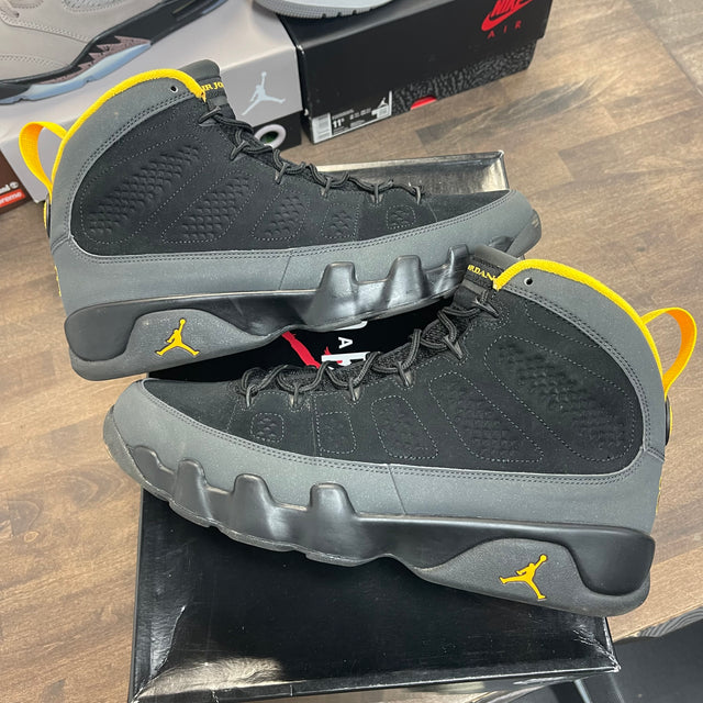 University Gold Dark Charcoal Jordan 9 Retro (USED)
