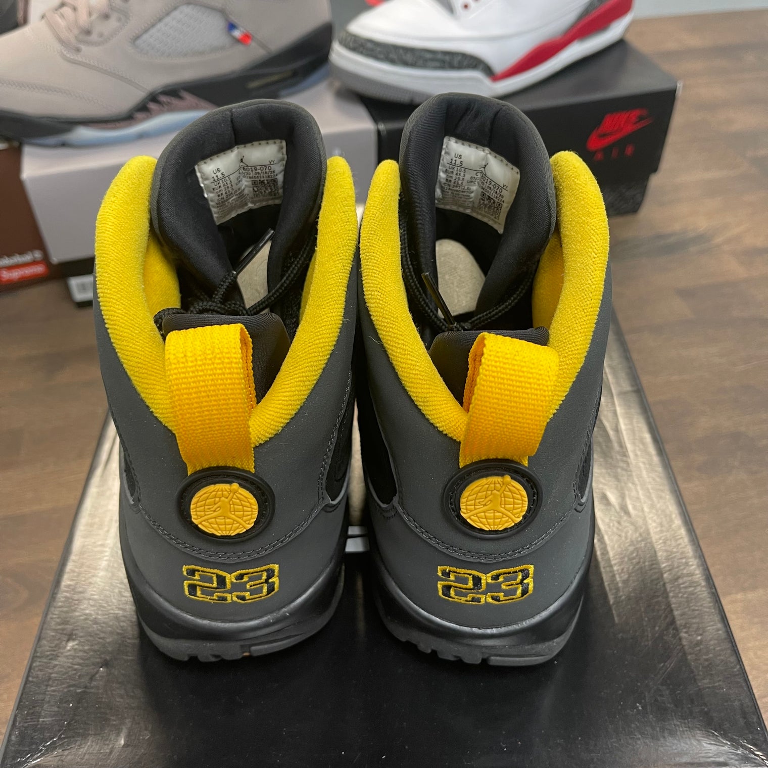 University Gold Dark Charcoal Jordan 9 Retro (USED)