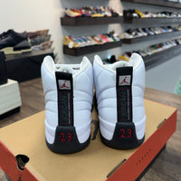 Taxi Flip Jordan 12 Retro (USED)