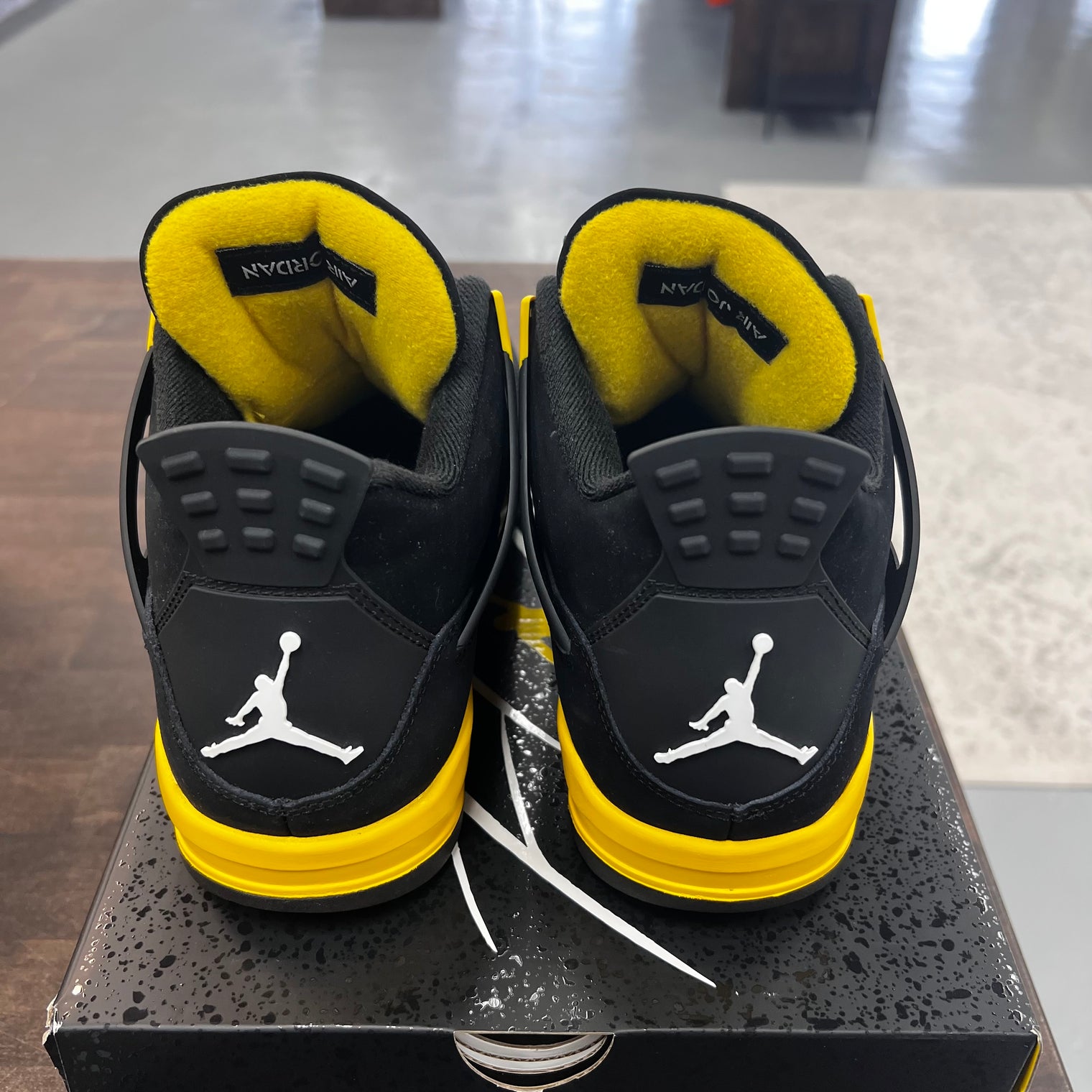 Yellow Thunder Jordan 4 (USED)