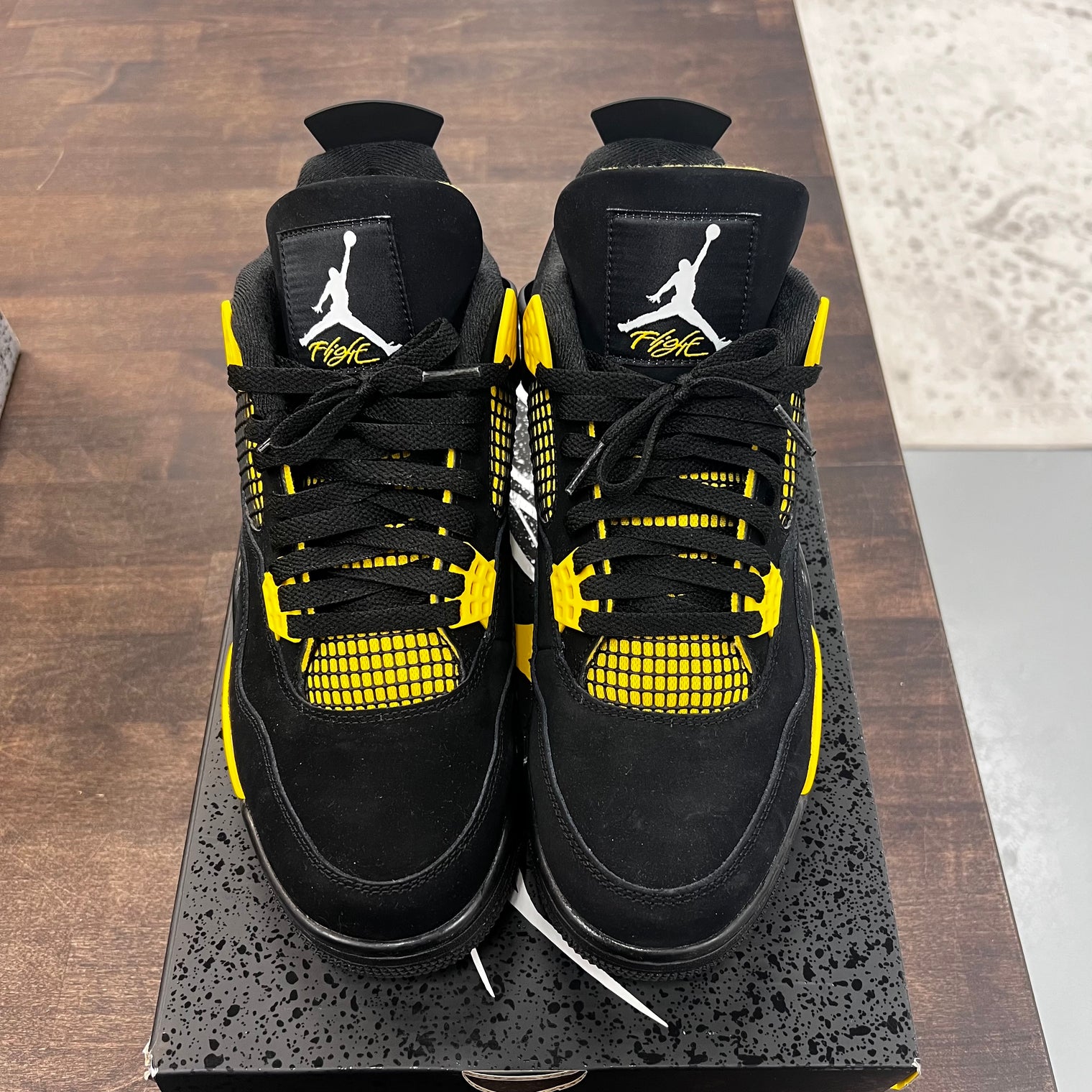 Yellow Thunder Jordan 4 (USED)