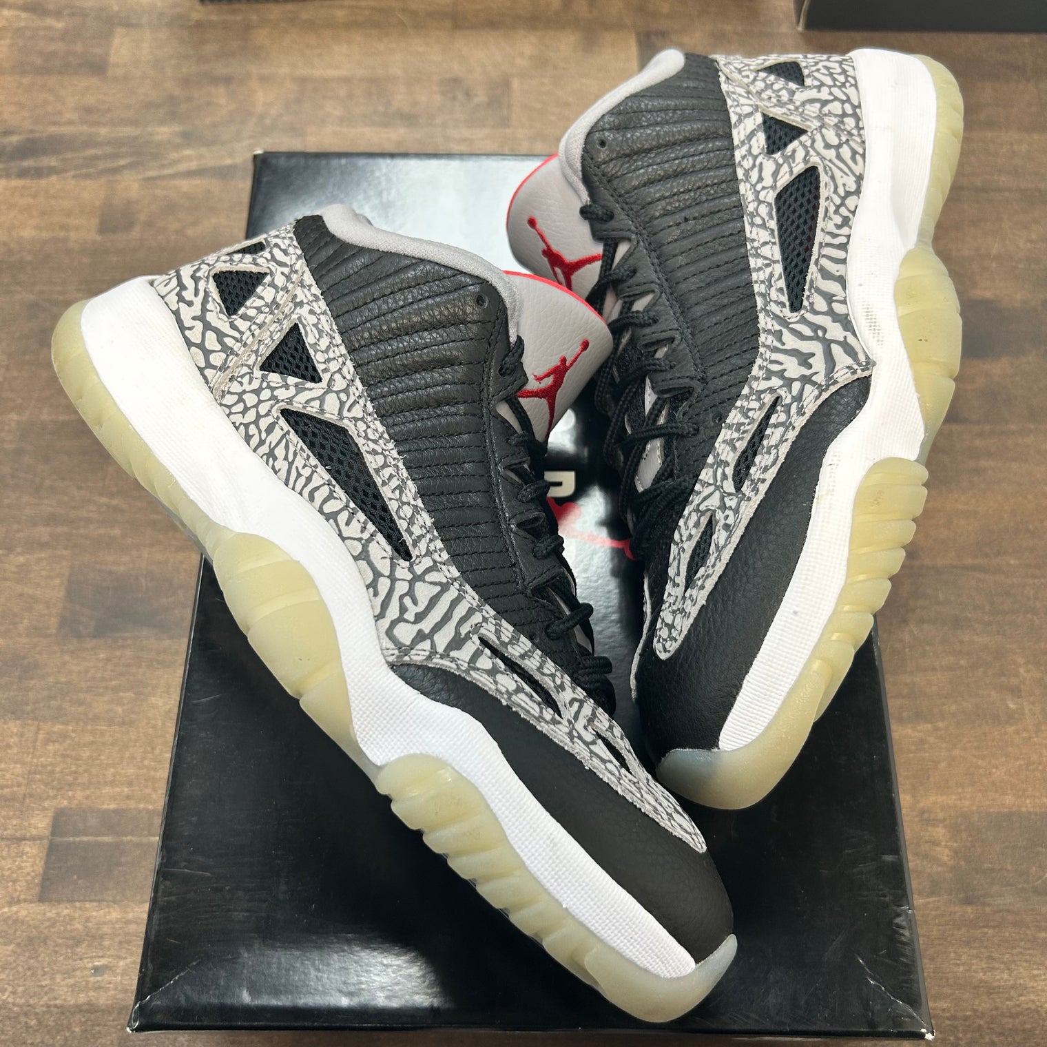 Black Cement Jordan 11 Low IE (USED)