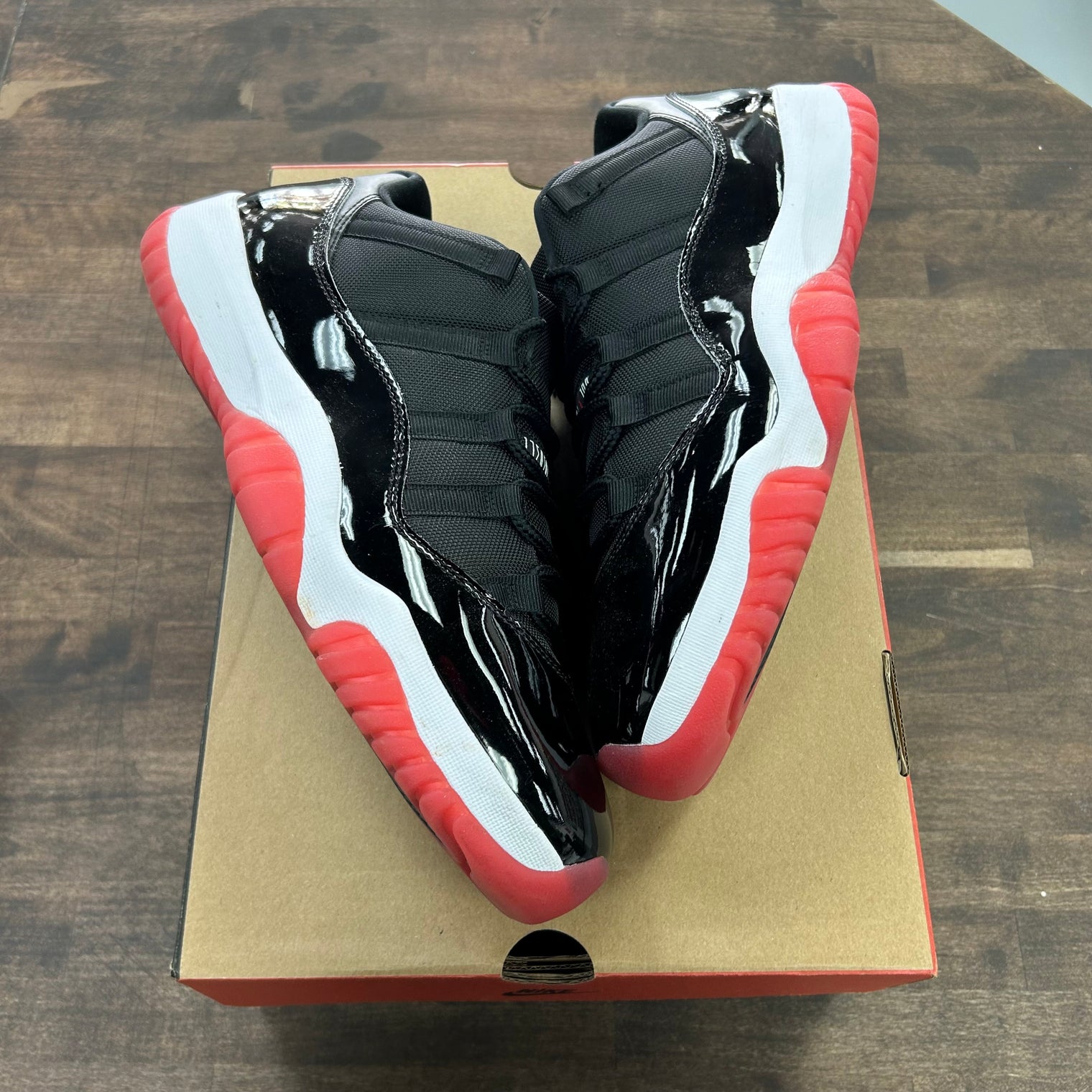 Bred Jordan 11 Retro Low (USED)