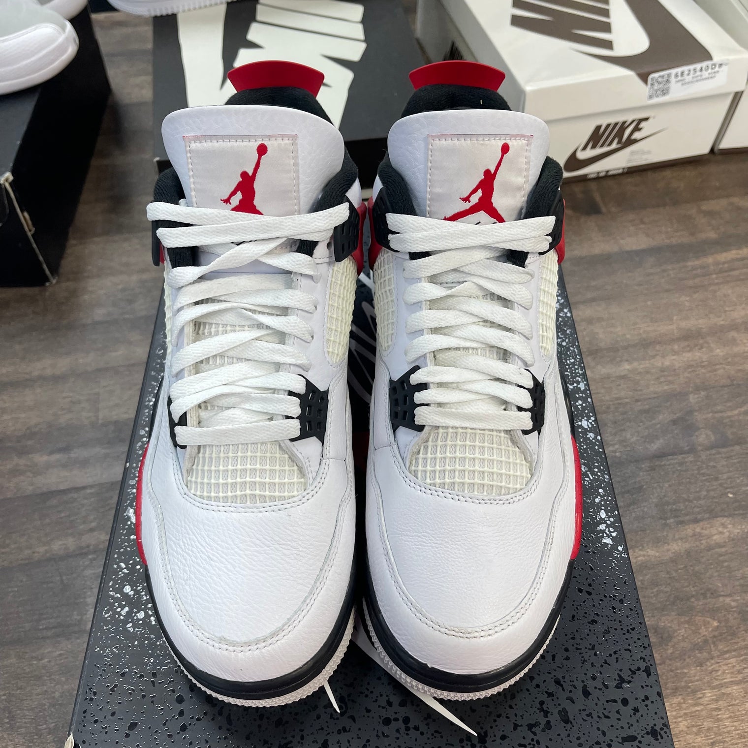 Red Cement Jordan 4 (USED)