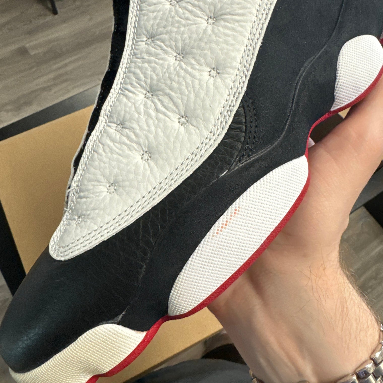 He got Game Jordan 13 (2013) (No box)