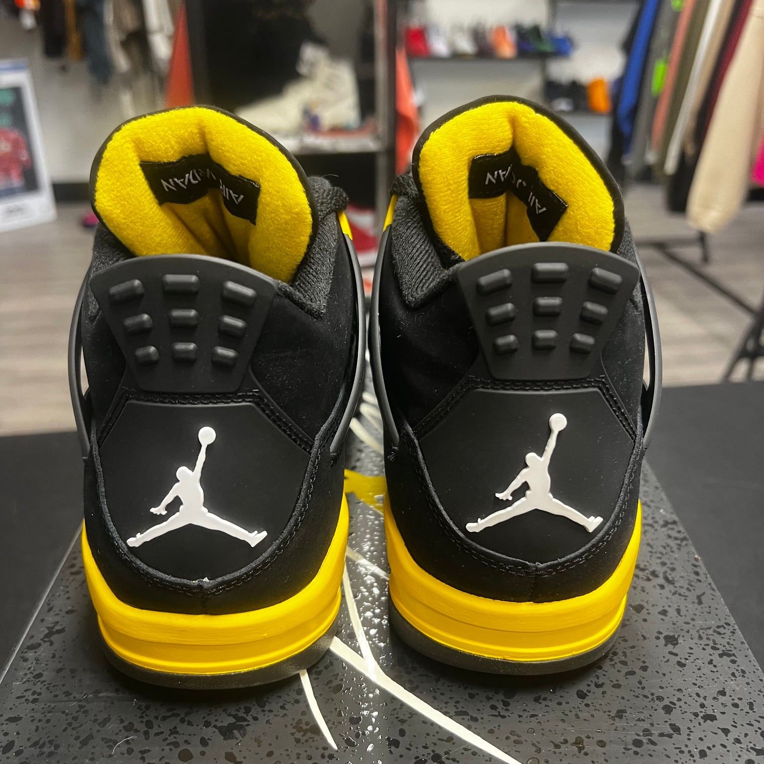 Yellow Thunder Jordan 4 (USED)