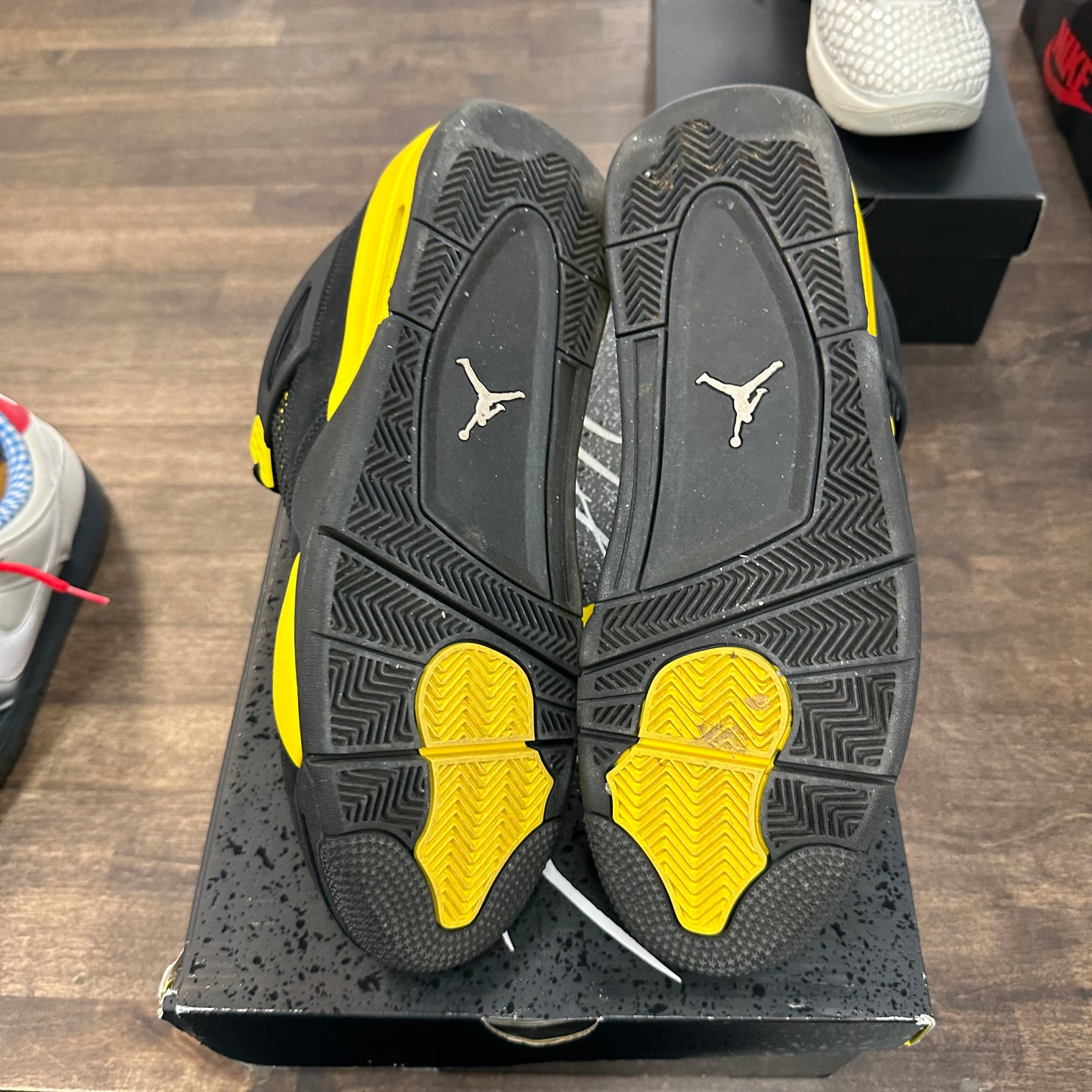 Yellow Thunder Jordan 4 (USED)